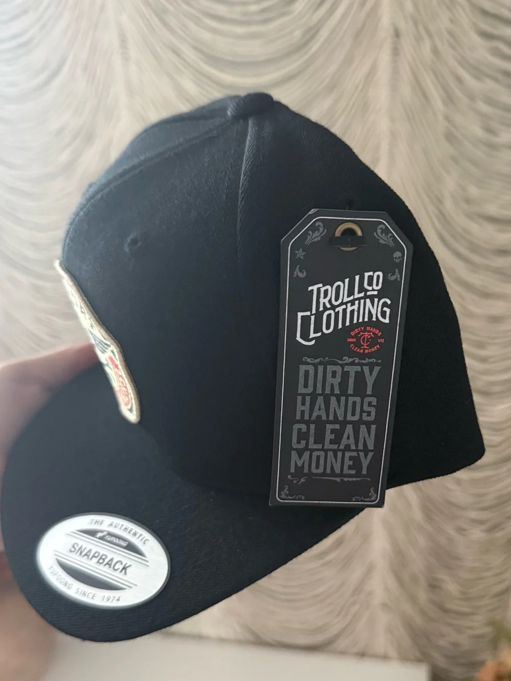 Trolls Black Snapback Hat with Red & Cream Support Patch